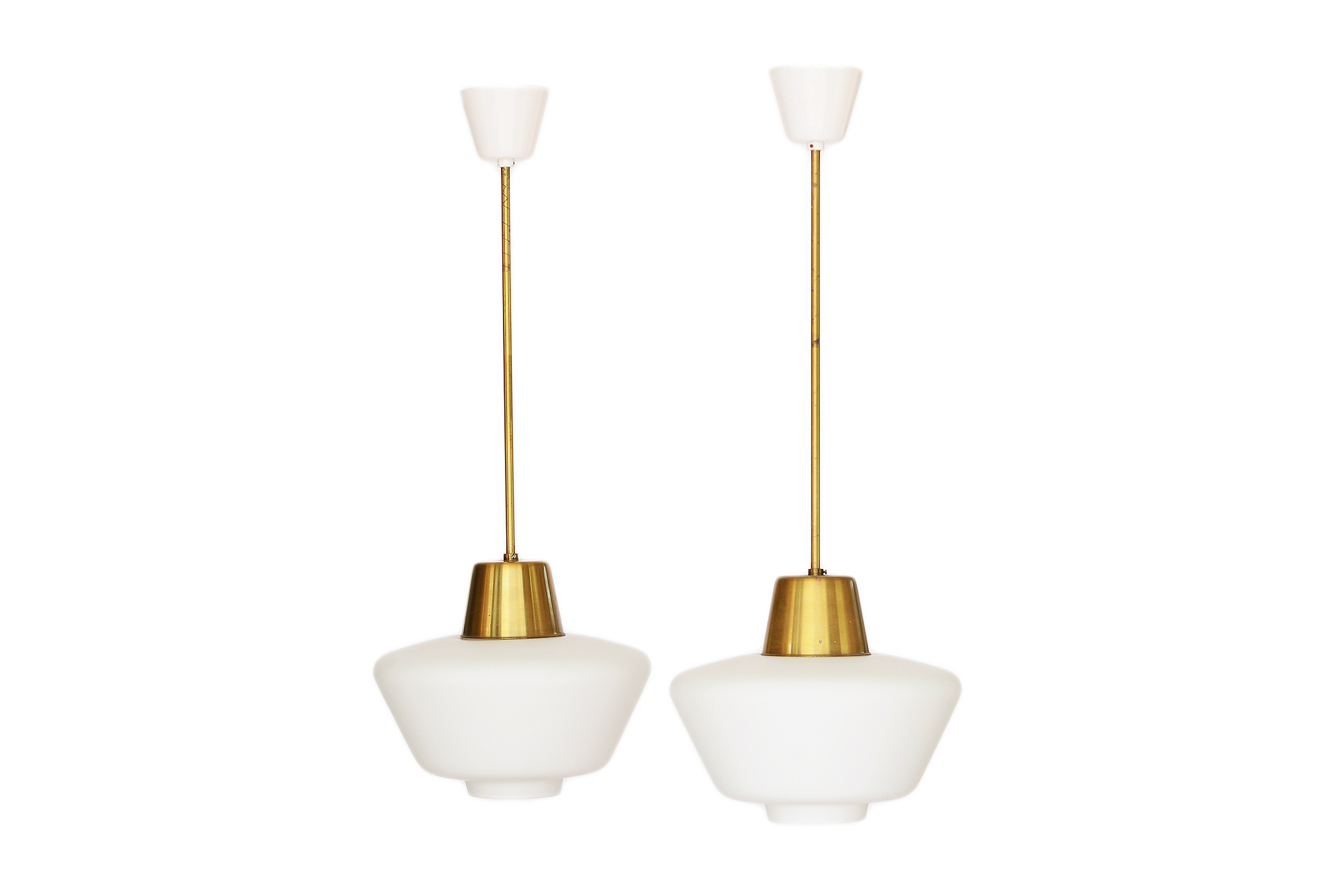 Pair of brass ceiling lights from ASEA. Hand blown opaline glass shades. Sweden 1960s.