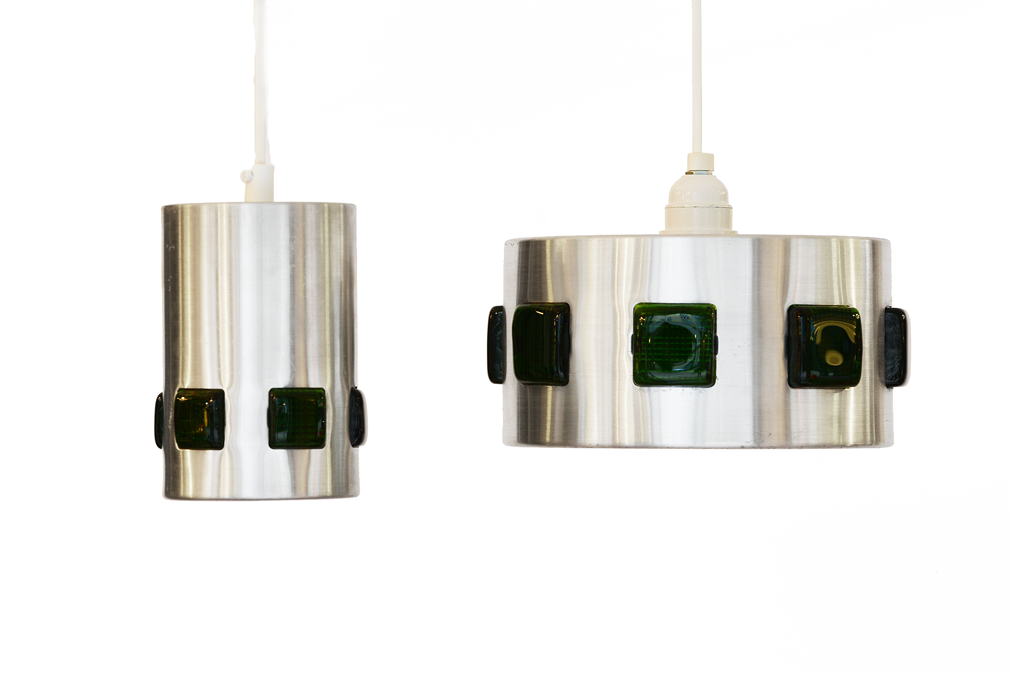 Pair of brushed aluminum pendant lights with green glass prisms. Sweden 1960s