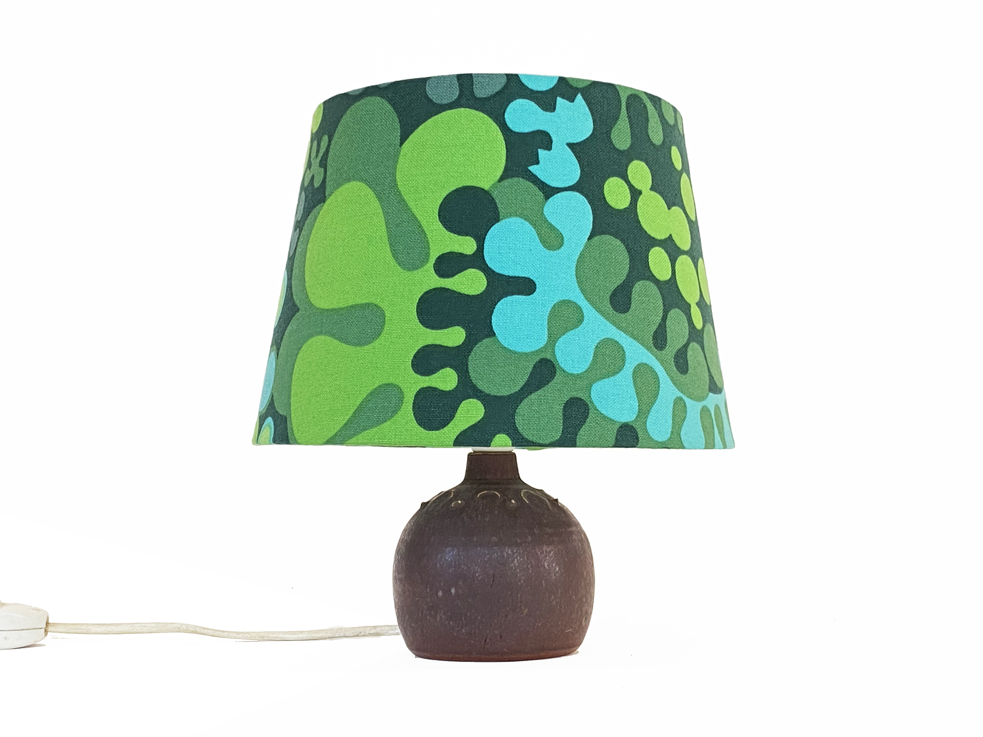 Small stoneware table light by Rolf Palm. Shade with repurposed vintage fabric by Göta Trägårdh. Sweden 1960s.